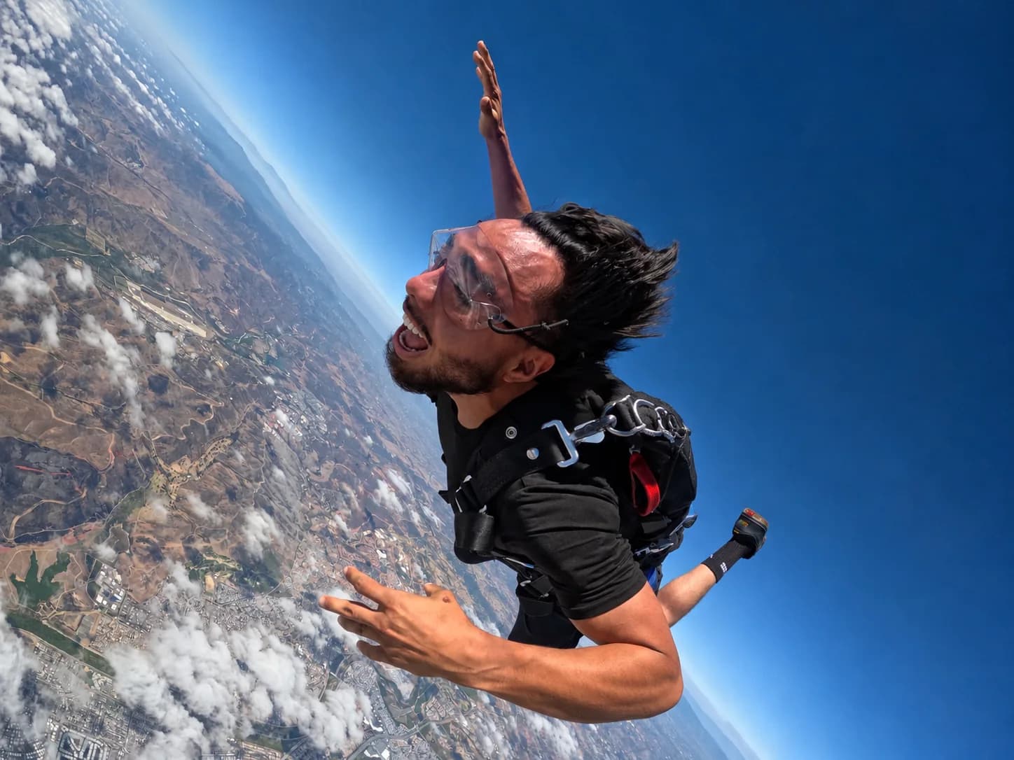 Alexander Lomeli skydiving over the California coast